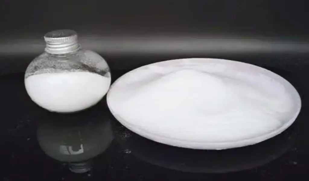 White powder sample displayed in jar and shallow dish.